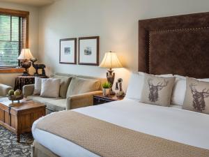 Ένα ή περισσότερα κρεβάτια σε δωμάτιο στο The Hotel Telluride