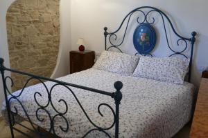 Ένα ή περισσότερα κρεβάτια σε δωμάτιο στο Umbria in Valigia&Vecchia CasSetta
