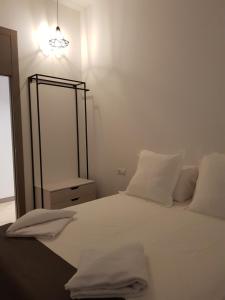 Posteľ alebo postele v izbe v ubytovaní S30 Reina Victoria