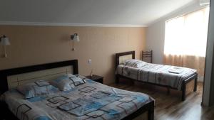 Voodi või voodid majutusasutuse Martvili Newhotel toas