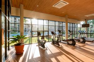 a gym with a bunch of exercise bikes in it at The Rain Cha-am Huahin By Thanon in Cha Am