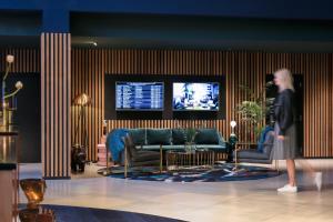 Зона вітальні в Naumi Auckland Airport Hotel