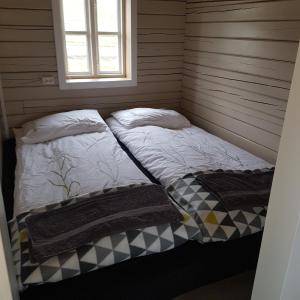 Кровать или кровати в номере Árfell