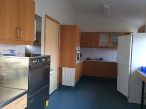 A kitchen or kitchenette at Helgafell Hostel