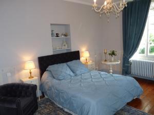 Letto o letti in una camera di Manoir des Chanterelles