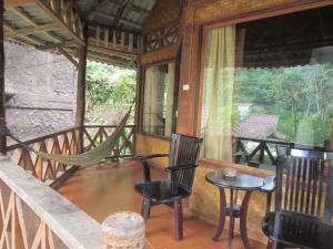 Μπαλκόνι ή βεράντα στο Junia Guesthouse Bukit Lawang