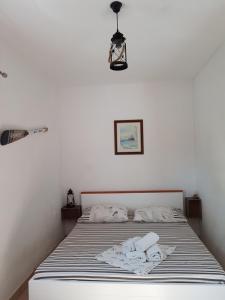 מיטה או מיטות בחדר ב-Apartment Adria