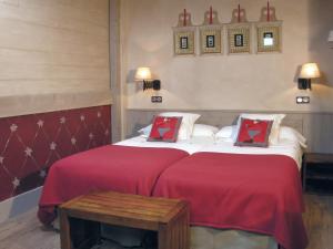 Ein Bett oder Betten in einem Zimmer der Unterkunft Hotel Plaza