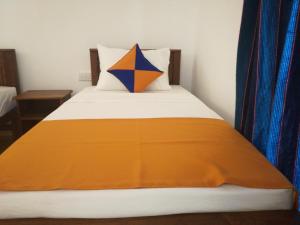 Postel nebo postele na pokoji v ubytování Mathews Holiday Resort