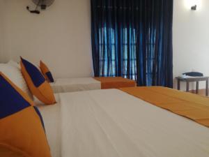 Postel nebo postele na pokoji v ubytování Mathews Holiday Resort