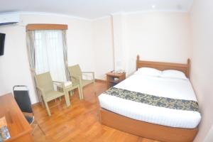 Katil atau katil-katil dalam bilik di Hotel Sidney