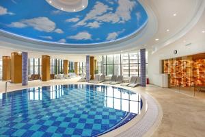 Bazén v ubytování A Hoteli - Hotel Sloboda nebo v jeho okolí