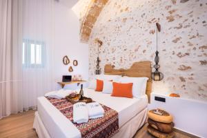 A bed or beds in a room at Madonna del Mare