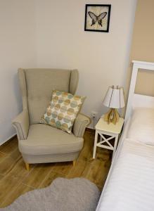Voodi või voodid majutusasutuse Hotel Drnholec toas