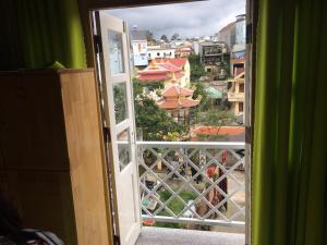 Balkón nebo terasa v ubytování Homestay Hoang Vy