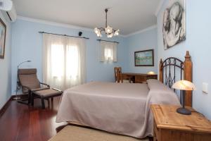 Postel nebo postele na pokoji v ubytování Casa Guisguey + 24 fotografií