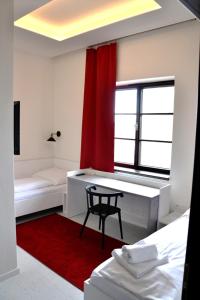 Voodi või voodid majutusasutuse Hotel Drnholec toas