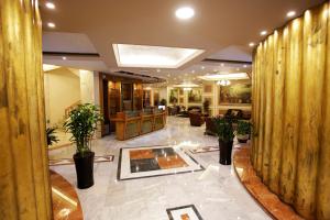 Posezení v ubytování Camelot Hotel