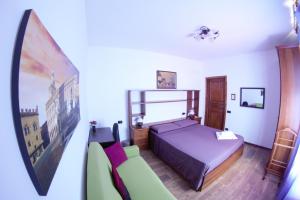 A bed or beds in a room at B&B Selvarossa