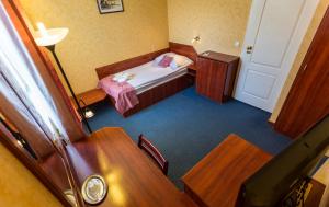 Postel nebo postele na pokoji v ubytování Classic Hotel