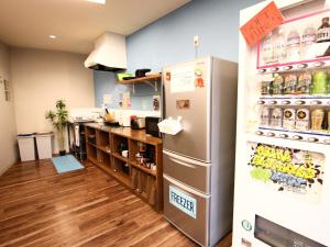 Kuchyň nebo kuchyňský kout v ubytování Osaka Guesthouse Nest