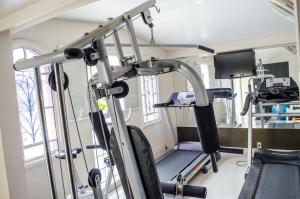 a room with a gym with a treadmill at Atalanta Hotel in Macapá