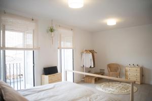 Posteľ alebo postele v izbe v ubytovaní Triplex Panoramic Ronda