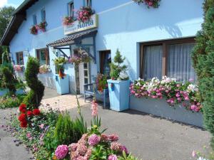 Κήπος έξω από το Hotel Garni "Adria"