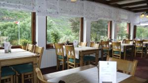 Restoranas ar kita vieta pavalgyti apgyvendinimo įstaigoje Hotel-garni-Kachelburg