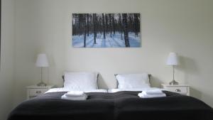 Postel nebo postele na pokoji v ubytování Hedenstugan B&B Hotel