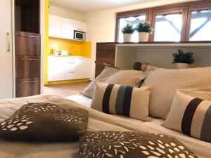 Postel nebo postele na pokoji v ubytování Apartmány Pinie Lipno
