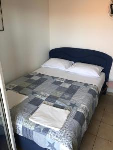 Ein Bett oder Betten in einem Zimmer der Unterkunft Apartmants Matić