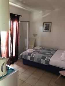 Ein Bett oder Betten in einem Zimmer der Unterkunft Apartmants Matić