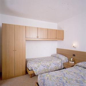 Postel nebo postele na pokoji v ubytování Residence Alba Nova