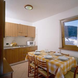 Kuchyň nebo kuchyňský kout v ubytování Residence Alba Nova