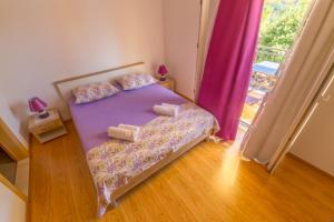 Postel nebo postele na pokoji v ubytování Rooms Karla