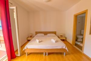 Postel nebo postele na pokoji v ubytování Rooms Karla