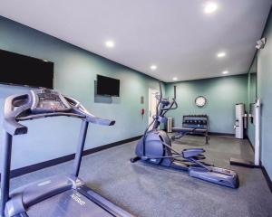 a gym with two exercise bikes in a room at Comfort Inn in Ferdinand