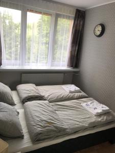 Ліжко або ліжка в номері Apartament Rona