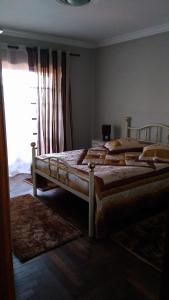 Katil atau katil-katil dalam bilik di Casa Deus