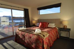 Voodi või voodid majutusasutuse Tekapo Sky Lodge toas