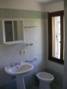 Ett badrum på Agriturismo Orsaiola