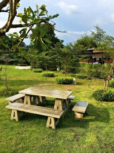 A garden outside The Loft Resort Kabin Buri