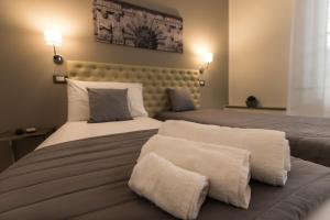 Posteľ alebo postele v izbe v ubytovaní Casantò guest home