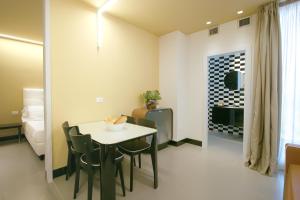 Кровать или кровати в номере Residence Terminus