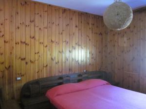 Postel nebo postele na pokoji v ubytování Agriturismo Stella Orobica