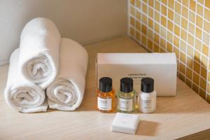a room with towels and a box on a table at Virgilio Grand Hotel in Sperlonga