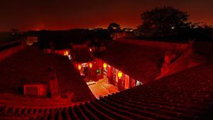 an overhead view of an empty theatre at night at Pingyao Xiangshengyuan Guest House in Pingyao