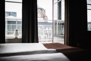 Postel nebo postele na pokoji v ubytování Freys Hotel