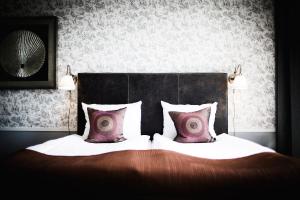 Postel nebo postele na pokoji v ubytování Freys Hotel
